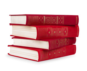 stack of vintage red books on white isolation