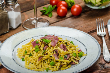 Homemade pasta with roasted Black Forest ham