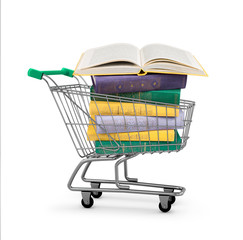 stack of colorful books in shopping card on an isolated white ba