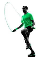 man jumping rope exercises fitness silhouette - obrazy, fototapety, plakaty