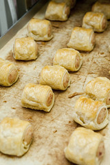 tray of sausage rolls from the oven