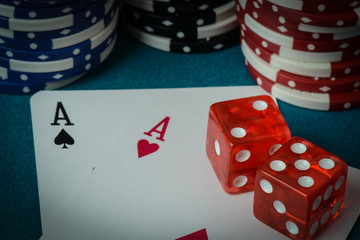 Playing Cards and Dice used with Gamling Chips