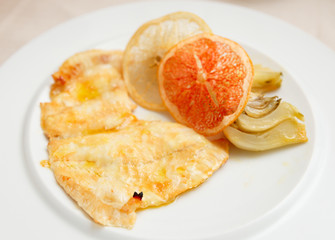 Fish fillet with artichokes and citrus chips