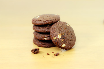Chocolate chip cookies on wooden background