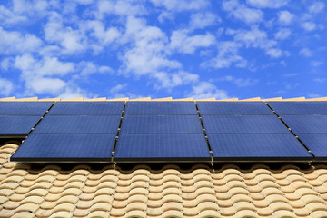 Rooftop Solar Panels on a Southwestern Style House © jessicakirsh