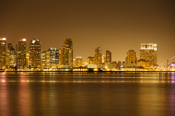 Fototapeta na wymiar San Diego Skyline and Reflections at Sunset from Shelter Island