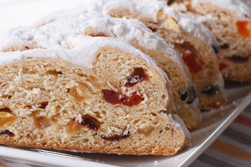 German Christmas fruit bread Stollen sliced, macro