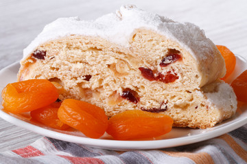 Slice of bread with raisins, dried apricots and candied