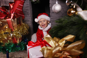 funny baby dressed as Santa Claus