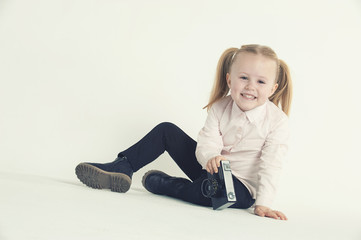 Smiling and having fun the photographer a beautiful blond girl o