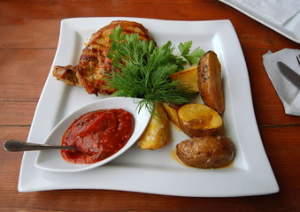 grilled meat and potatoes