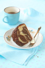 Piece of Marble Cake with Chocolate Frosting