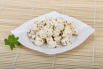 Cheese with spices and oil