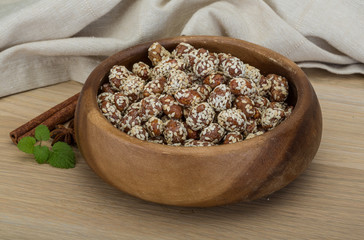 Peanut in honey with sesame seeds