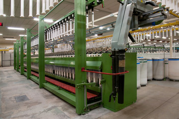 Fototapeta na wymiar Textile industry - Spinning