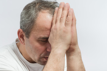 Fototapeta premium Man Praying With Hands Closed