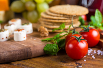 fresh organic tomatoes with basil and rock salt