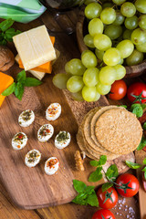 overhead view small cheese bites on with herbs