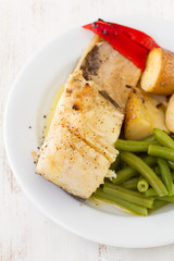 fish with vegetables on plate