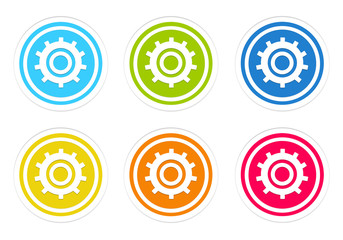 Set of rounded colorful icons with gears symbol