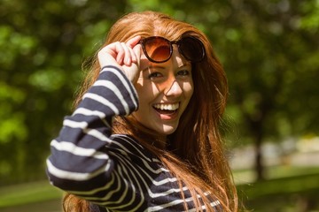 Beautiful young woman wearing sunglasses