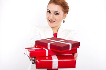 Young girl in red dress with gift red box