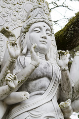 Close up view of a beautiful Buddha statue on a park.