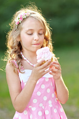 portrait of a beautiful little girl in pink