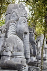 Fototapeta na wymiar Close up view of a beautiful elephant statue on a park.
