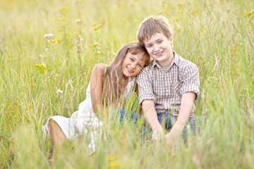 Small Brother and sister in summer nature