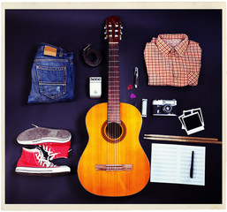 Fototapeta premium Music equipment, clothes and footwear on black background