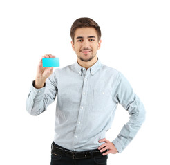 Handsome young man holds cutaway isolated on white