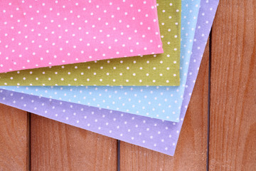Obraz premium Colorful napkins on wooden table