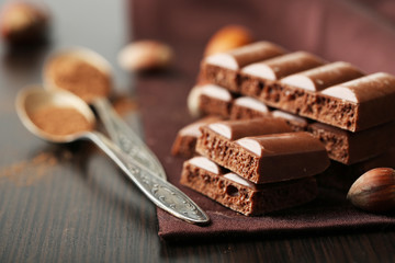 Tasty porous chocolate on table, close up