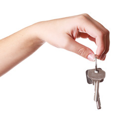 Keys in hand isolated on white
