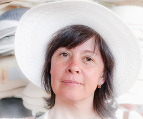 happy woman in a hat