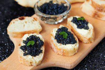 Black caviar on a slice of bread