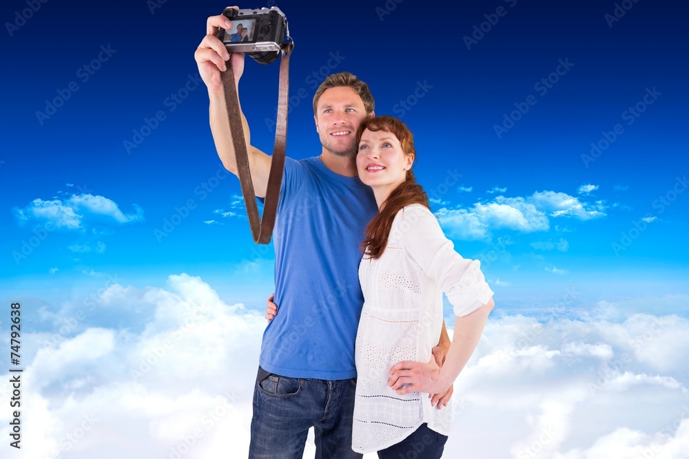 Aufkleber composite image of couple using camera for picture