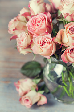 Bouquet of beautiful roses in vase