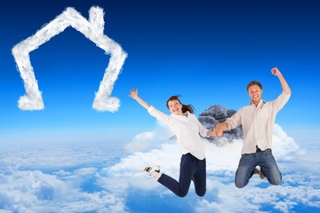 Composite image of couple jumping and holding hands