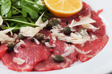 Beef carpaccio with parmesan and rocket salad