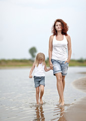 portrait of a happy family on summer nature