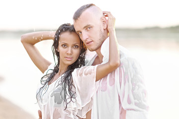 Obraz premium beautiful Couple in love on summer beach