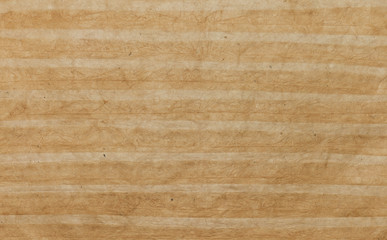 Texture of handmade striped paper sheet as background