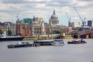 Fototapeta na wymiar St. Paul's Cathedral and Thames river in London