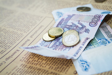 russian roubles banknotes and euro and dollars coins