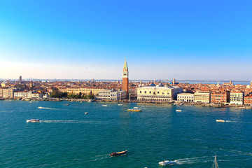 Fototapeta na wymiar Boats in the bay of San Marco in Venice