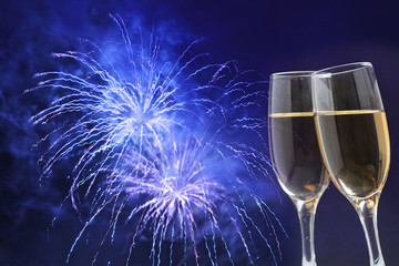 Celebrating New year with champagne and fireworks