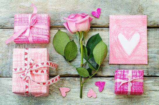 Valentine's background with a gifts, flower and card