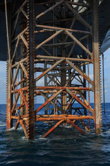 Underneath Jack Up Drilling Rig In The Ocean - Oil and Gas Indus